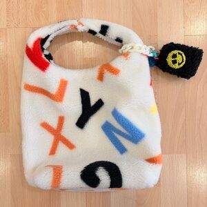 MAKOMAKI | Multicoloured fuzzy hand bag with charm